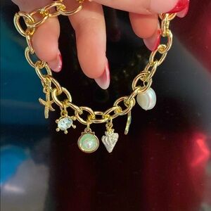 Gold Charm Bracelet with Sea-Inspired Accents